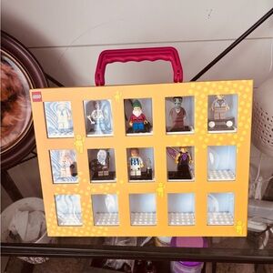 LEGO Minifigure Display Case with Red Handle and Yellow Frame